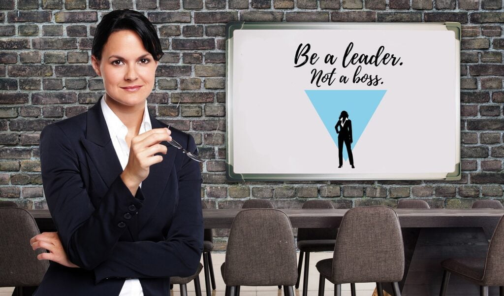 a woman leader with white board